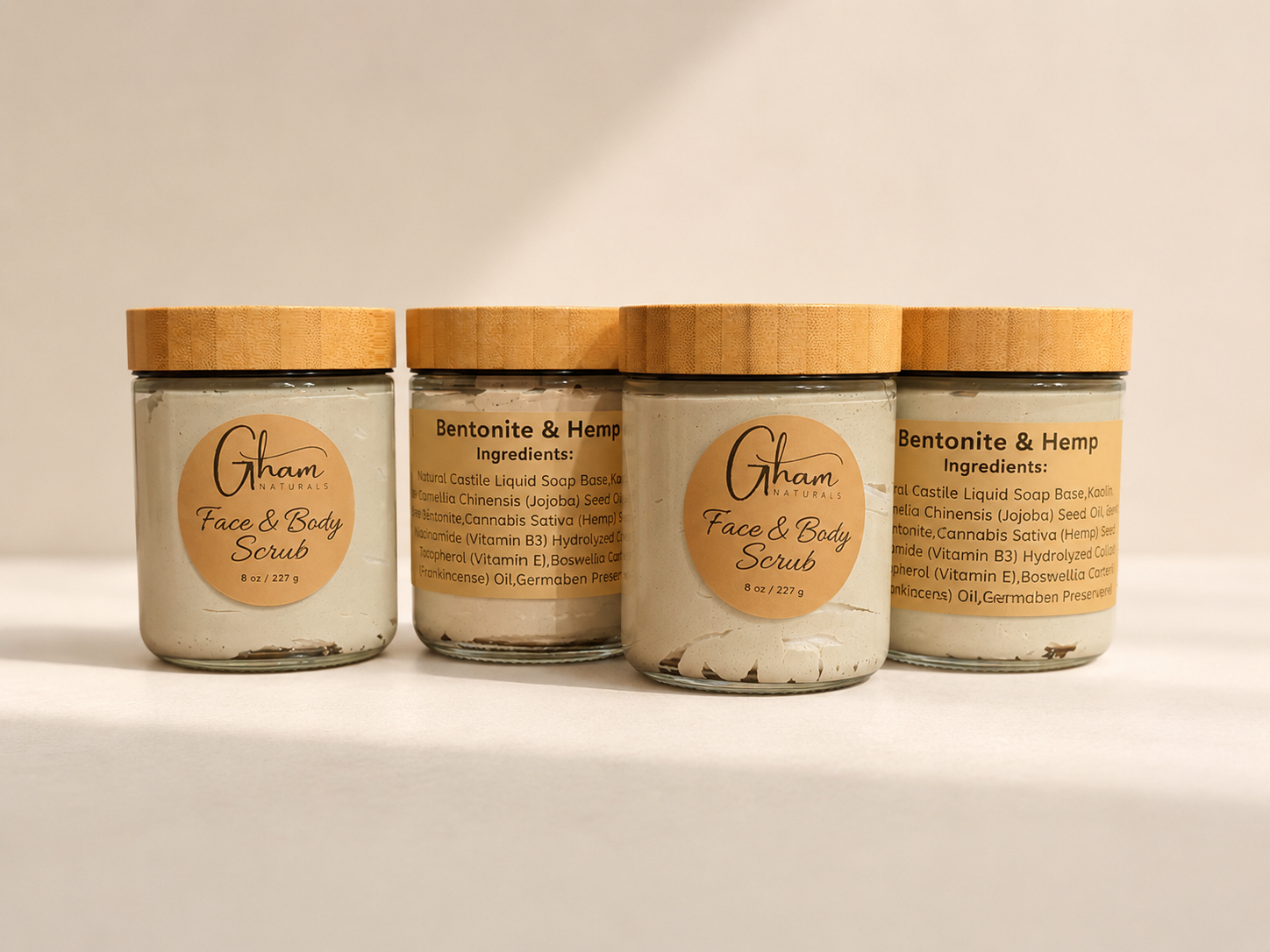 Bentonite & Hemp Face + Body Scrub jars showing the ingredient label