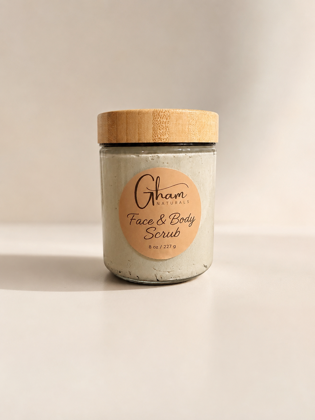 French Green Clay Face + Body Scrub in an 8 oz glass jar
